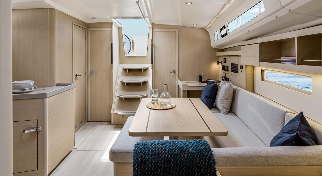 Saloon looking forward, seating either side of the dining table