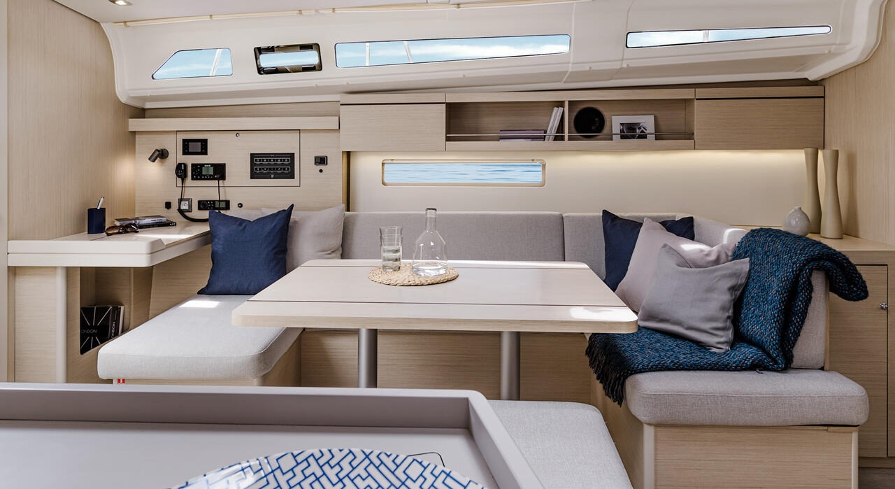 Saloon berth and stowage shelves beneath the coachroof windows