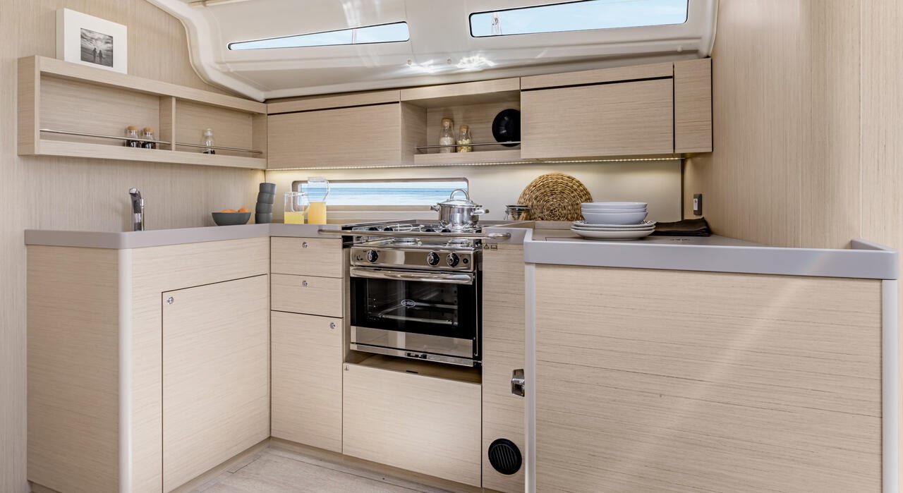 Galley with two-burner hob, sink and worktop stowage