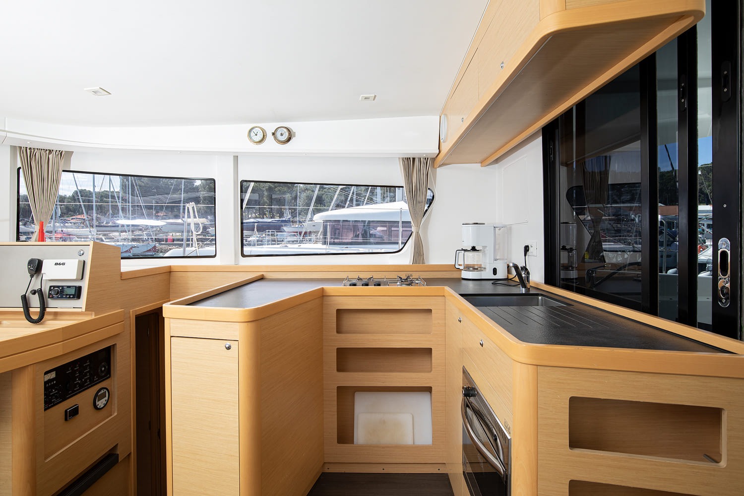 Saloon looking towards the galley, with oven, sink and worktop along the side.