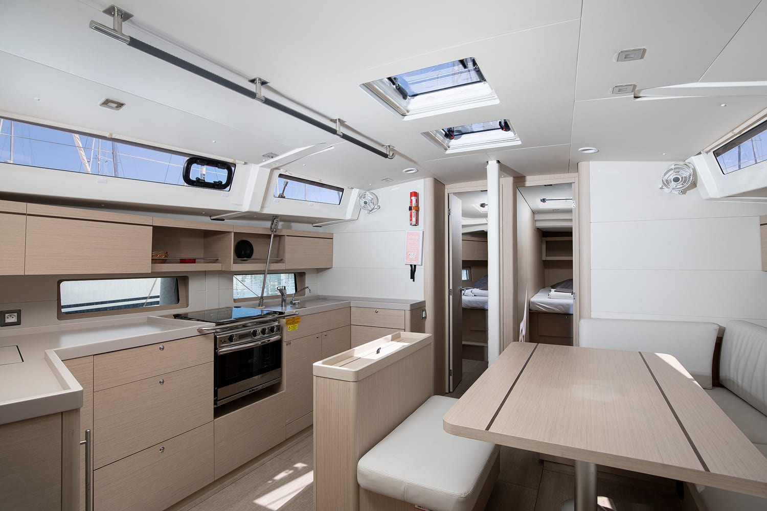 Saloon of the Beneteau Oceanis 46.1 looking forward towards the galley